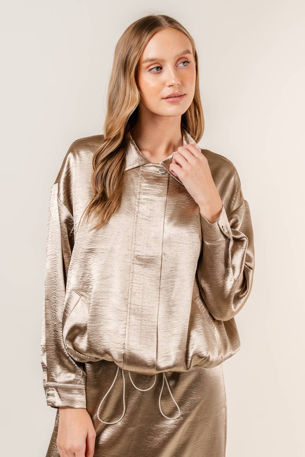 Satin jacket styled with denim